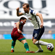 Harry Kane makes a move on João Moutinho